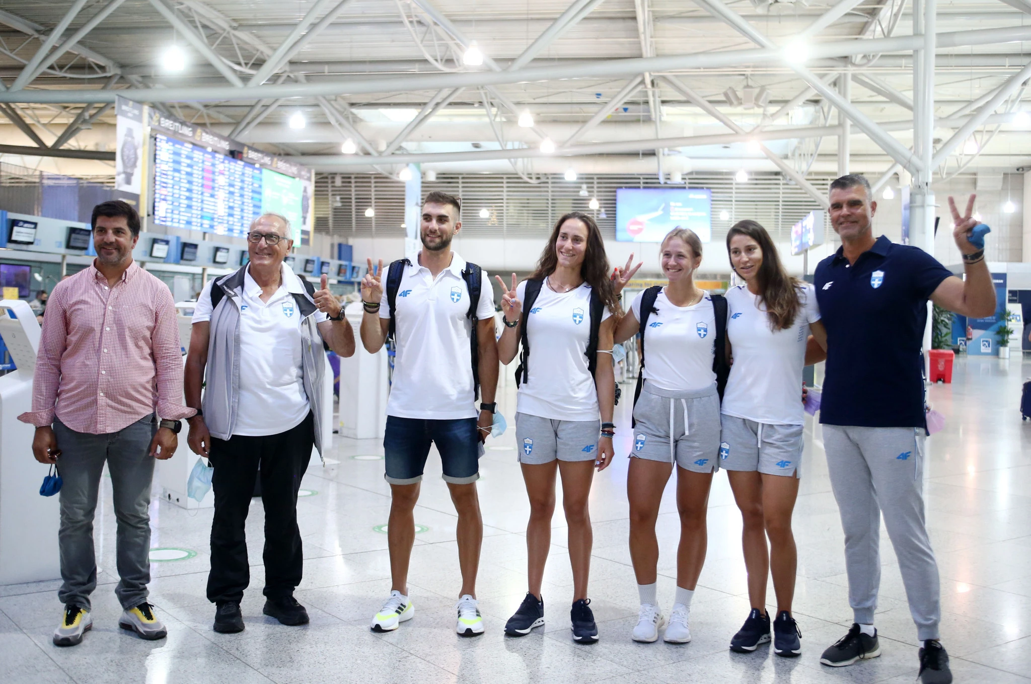 Ο Ποστιλιόνε με μέλη της Ολυμπιακής ομάδας του 2021 / Πηγή: Intime